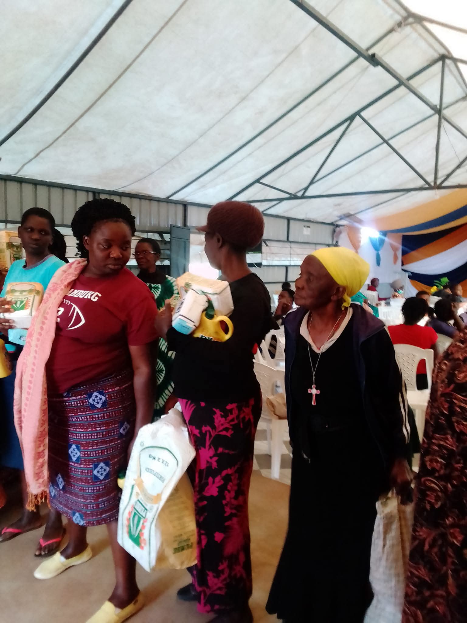 Community members receiving donations