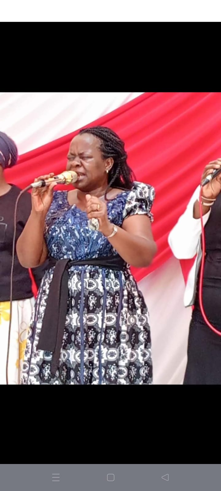 Woman singing during worship