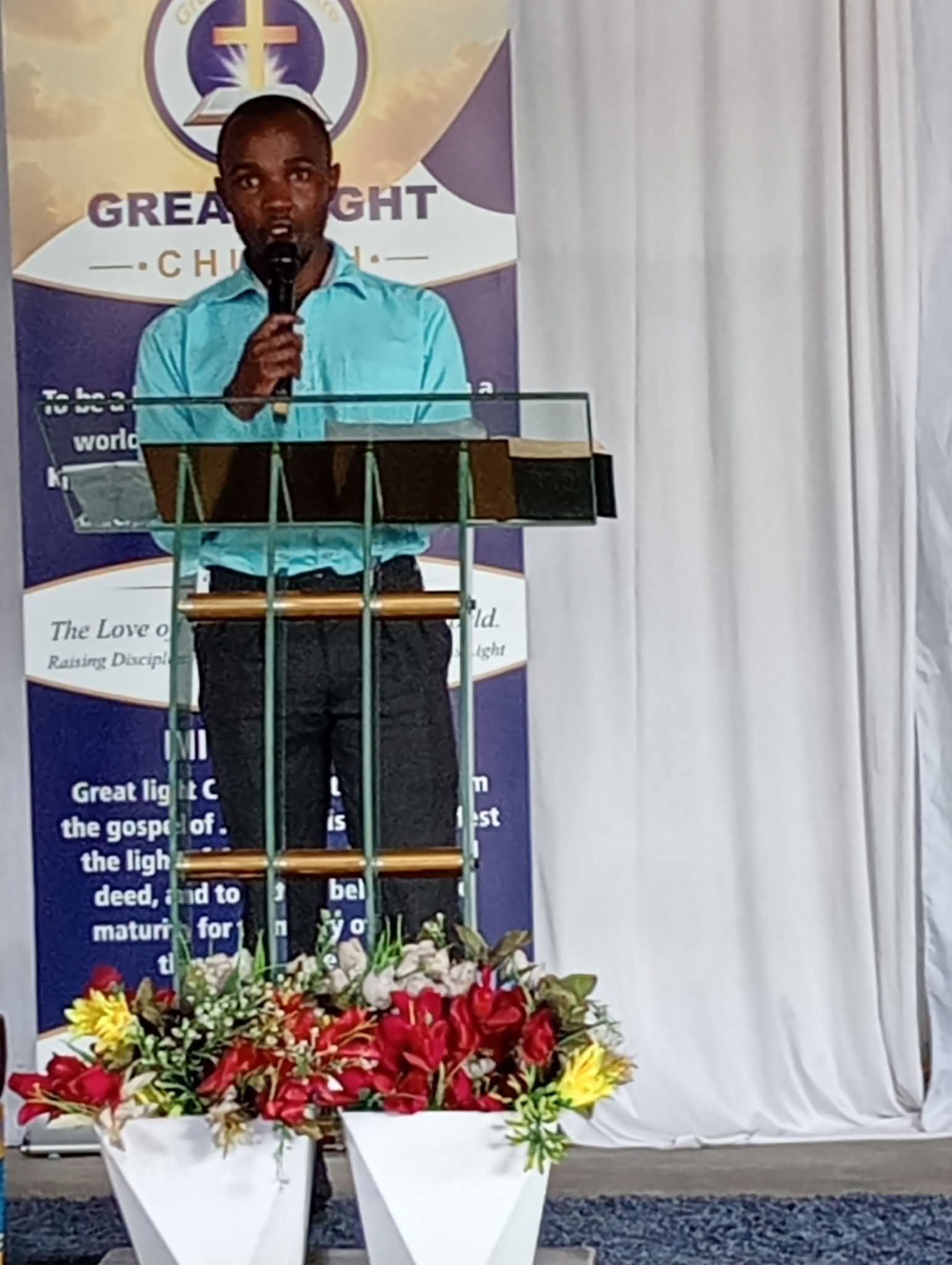 Pastor Brian Ombete speaking at Great Light Centre